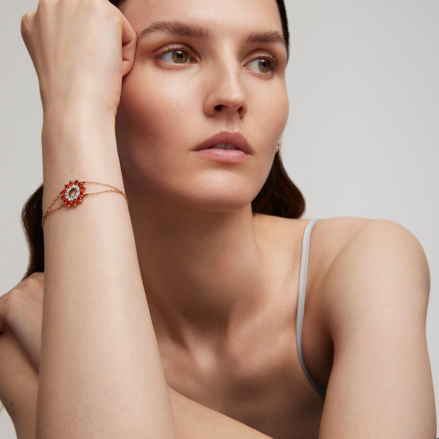 bracciale in oro con diamanti e opali a forma di fiamma tous atelier
