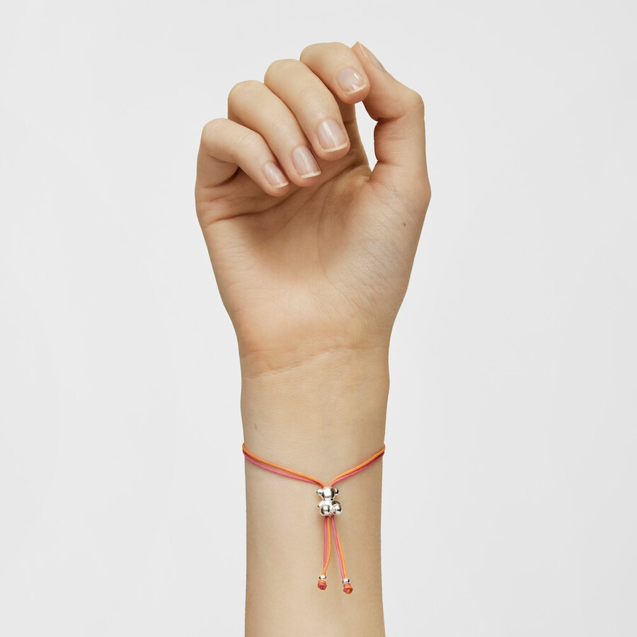 bracciale bold bear con cordino fucsia e arancione e un orso argentato