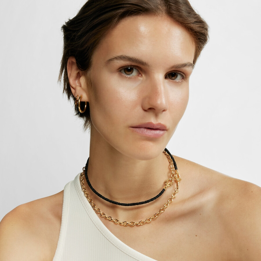 collanabracciale elastico tous manifesto con placcatura in oro 18 kt su argento e cordino nero