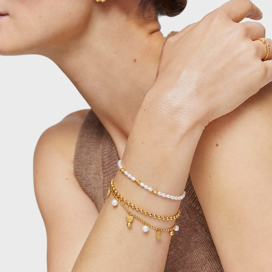 bracciale a catena con placcatura in oro 18kt su argento e perle coltivate e motivi tous grain