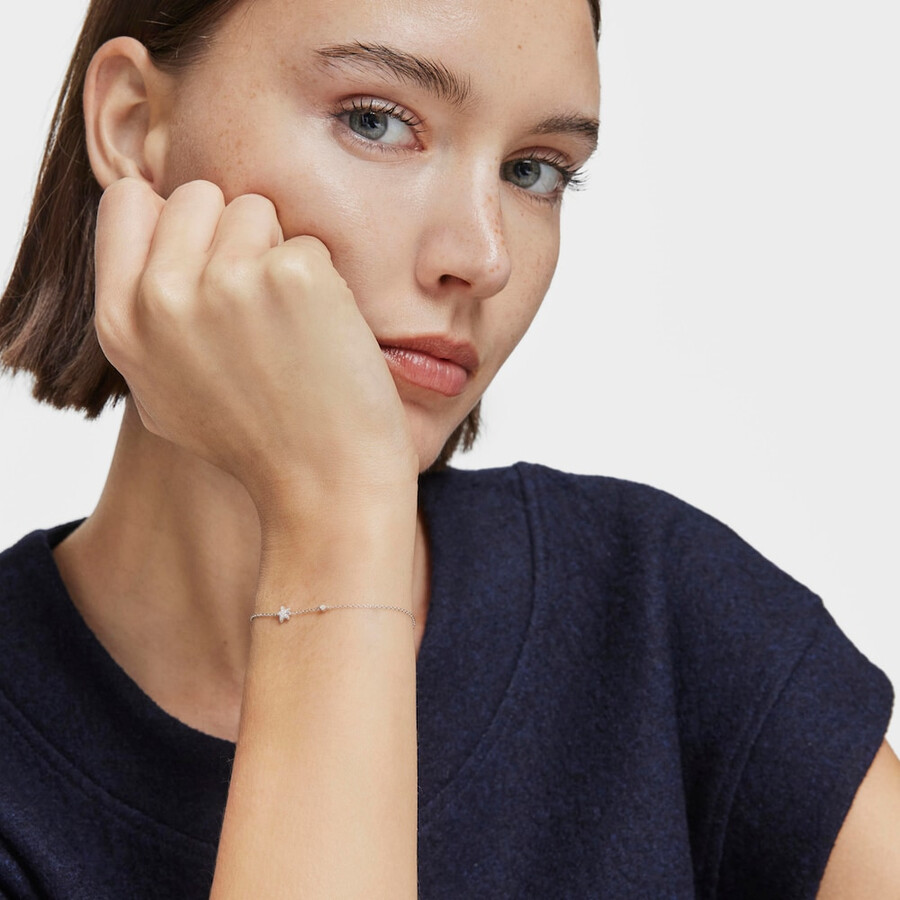 bracciale a catena con stella in oro bianco e diamanti tous grain