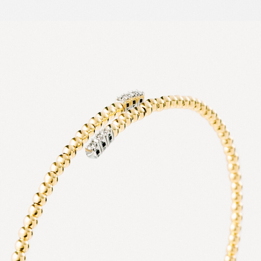 bracciale aperto in oro con diamanti tous atelier