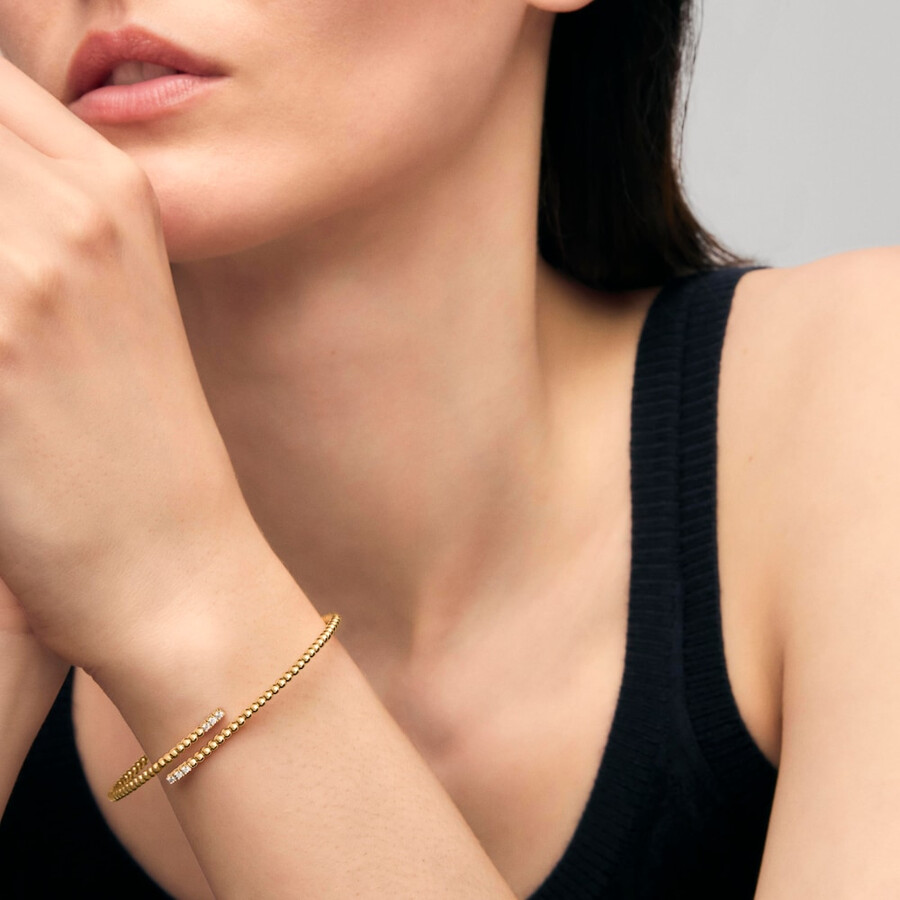 bracciale aperto in oro con diamanti tous atelier