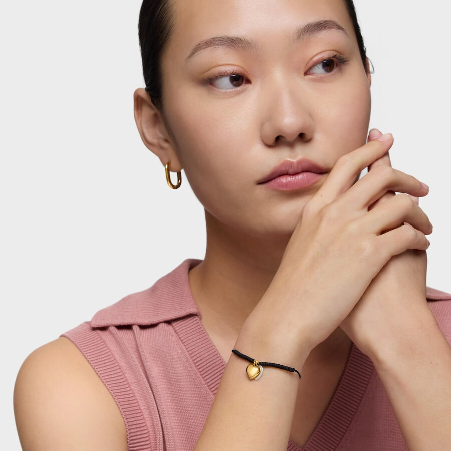 bracciale doppio cuore con placcatura in oro 18kt su argento e nylon nero tous flechazo