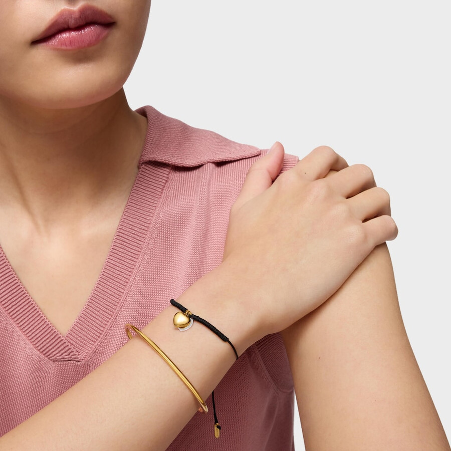 bracciale doppio cuore con placcatura in oro 18kt su argento e nylon nero tous flechazo