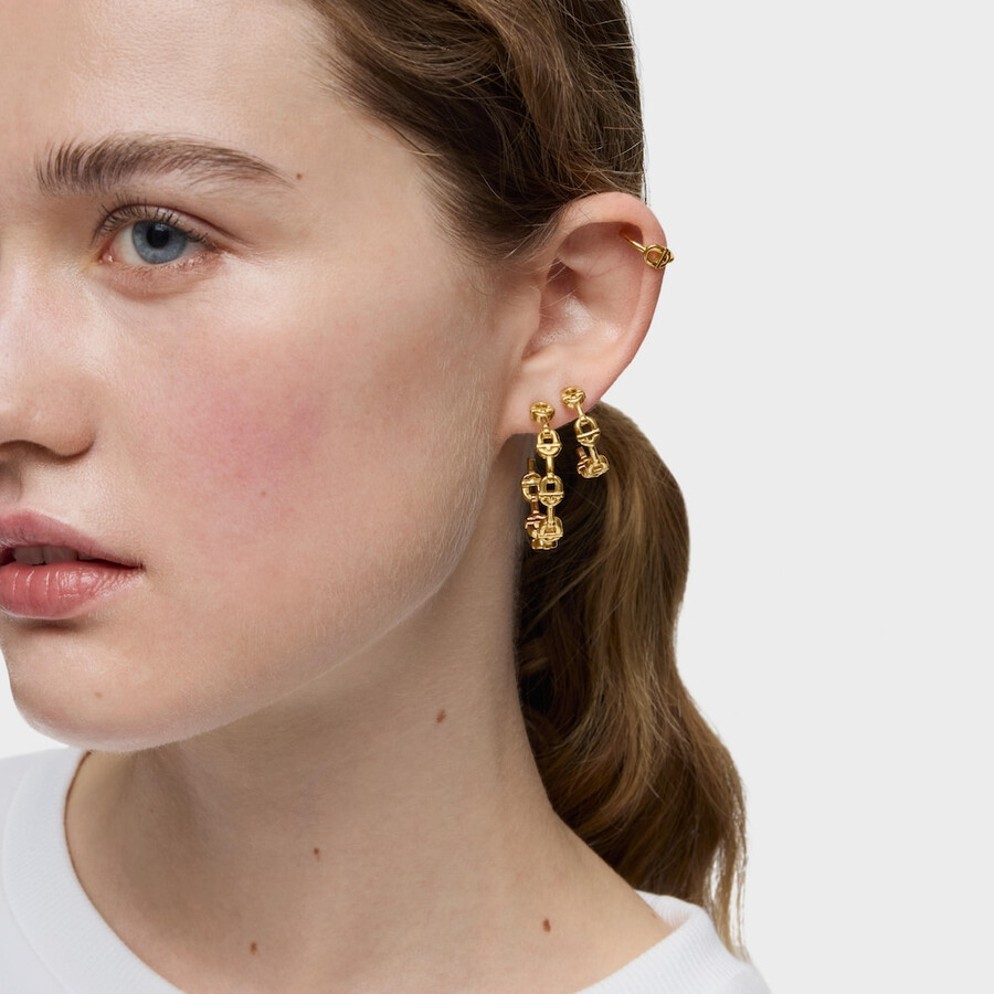 orecchini a cerchio da 30 mm placcati in oro 18kt con logo in argento tous manifesto