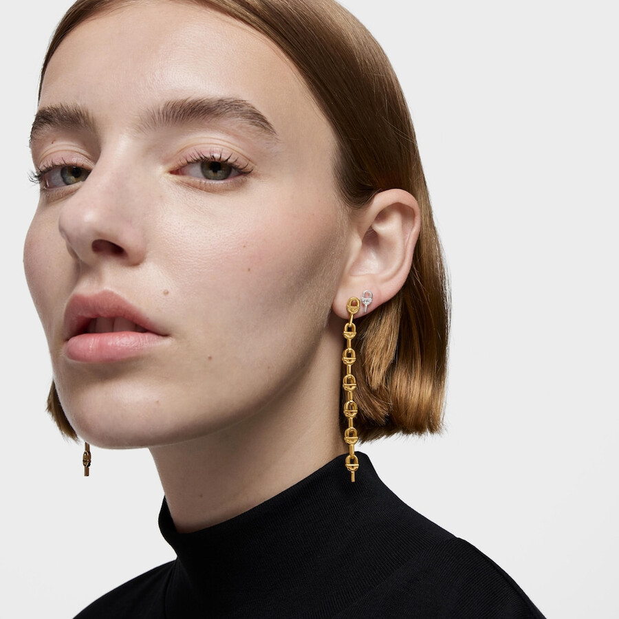 orecchini lunghi da 30 mm placcati in oro 18kt con logo in argento tous manifesto