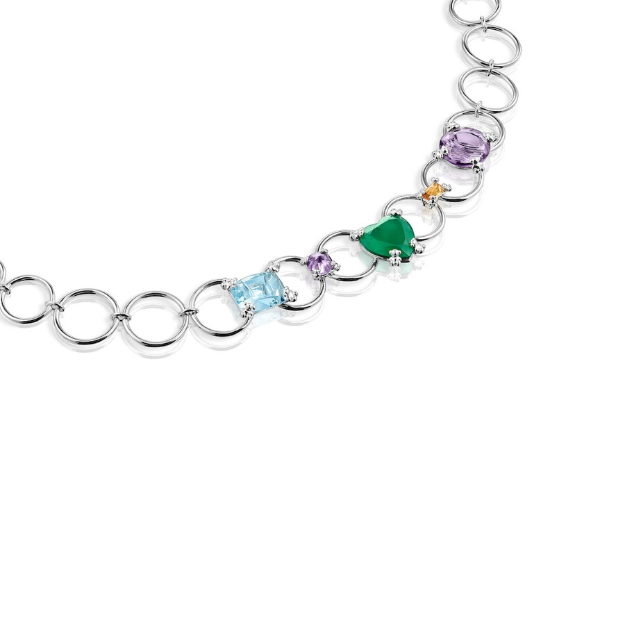 collana con anello color argento e pietre preziose