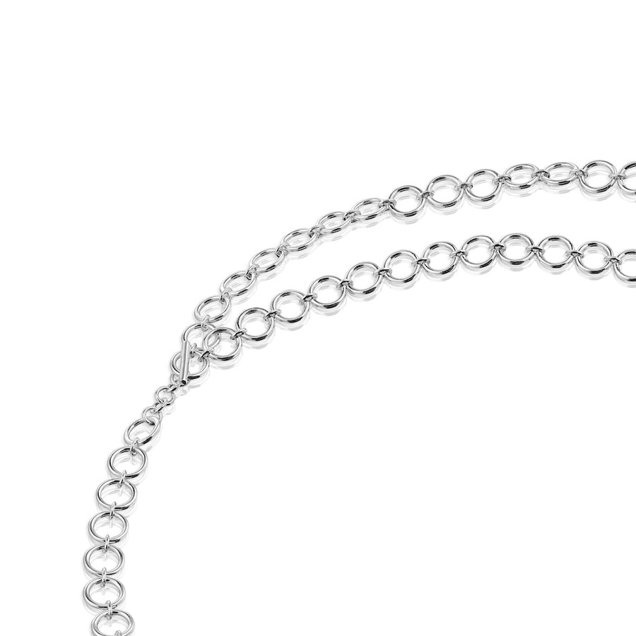 collana con anello color argento e pietre preziose