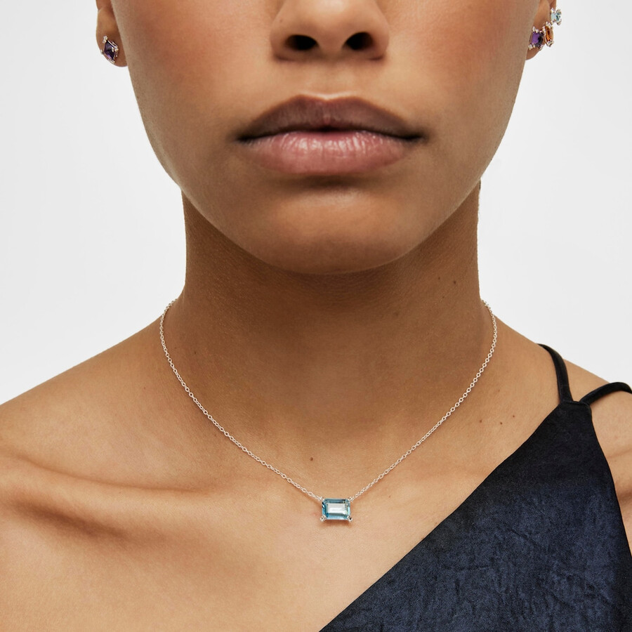 collana con pillole color argento e topazio