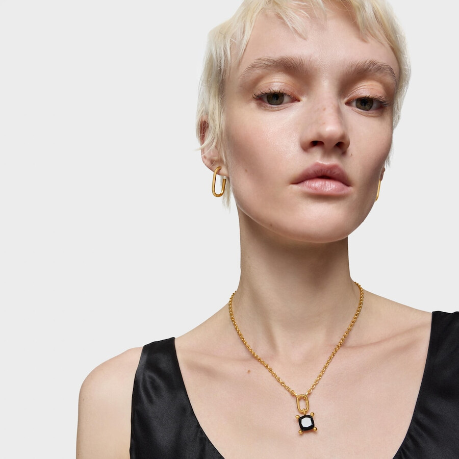 piccolo ciondolo a forma di orso placcato in oro 18kt su argento con onice colore nero