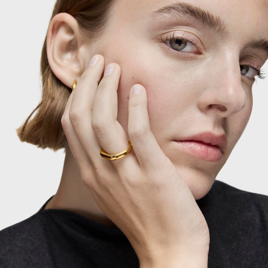 linea di anelli aperti placcati in oro 18kt su argento