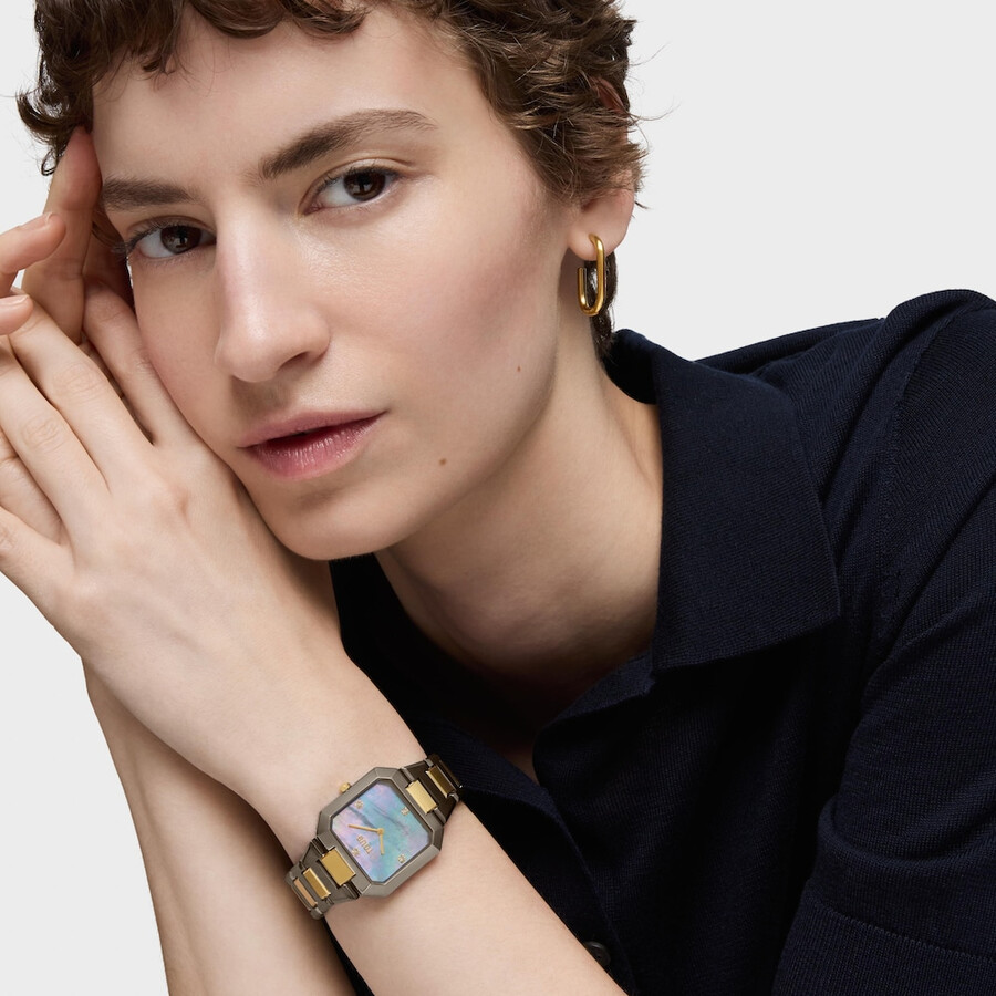 orologio analogico con bracciale in acciaio color nero e oro e quadrante in madreperla grigia karat