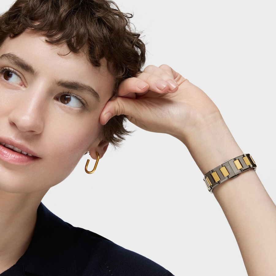 orologio analogico con bracciale in acciaio color nero e oro e quadrante in madreperla grigia karat